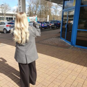 Person using homemade Solar Eclipse Viewer.